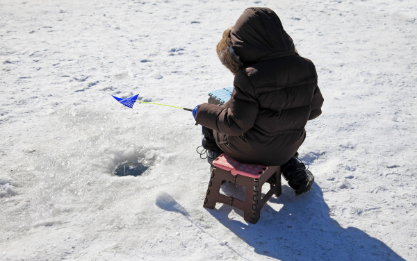 Fishing in the frozen river in winter -  Hwacheon Mountain Trout Festival (Hwacheon, Gangwon-do, Korea)